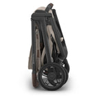UPPAbaby Kona Stroller - Ada (Sandstone Mélange/Chestnut Leather/Carbon Frame) UPPAbaby