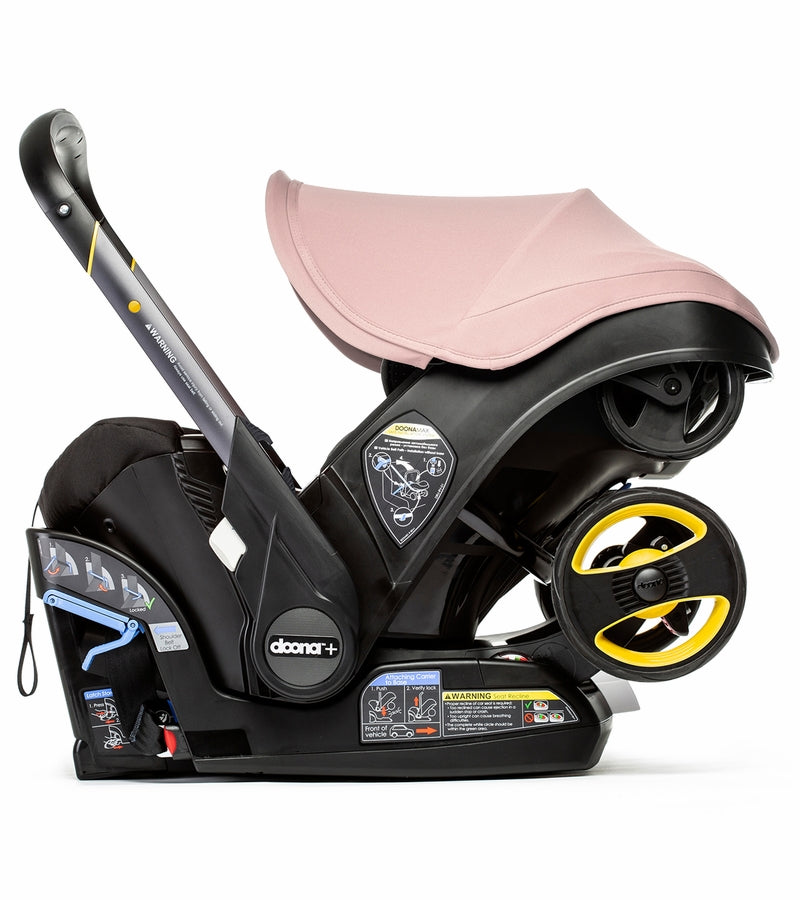 pink car seat and stroller Doona Infant Car Seat & Stroller